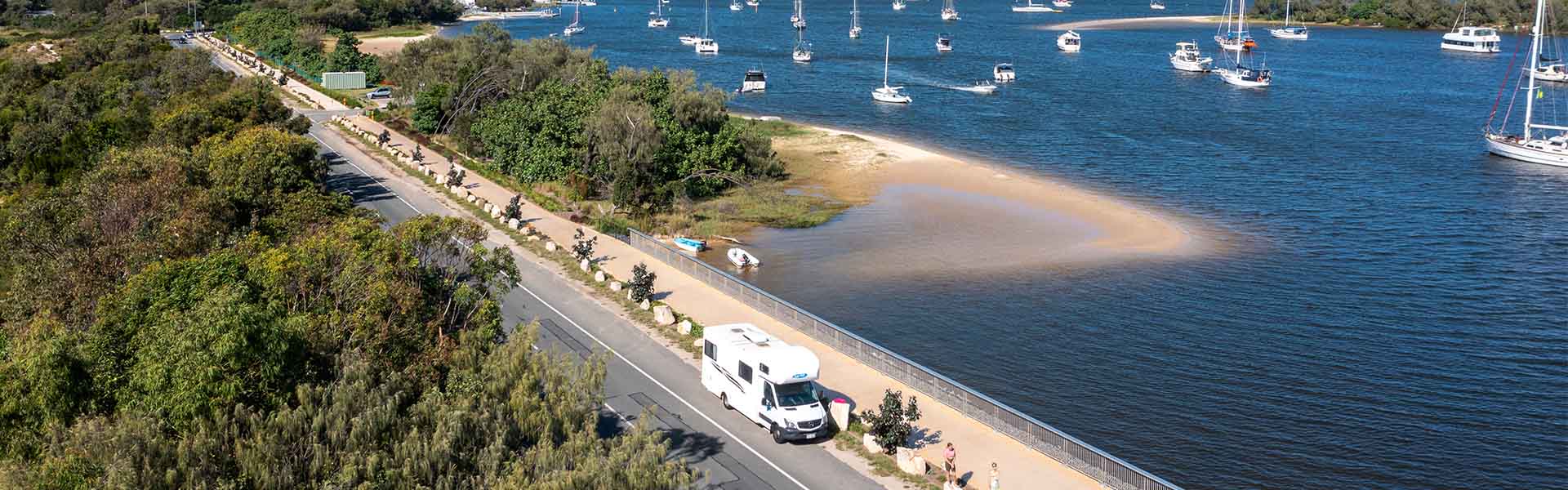 Cheapa Campa motorhome parked on waterfont